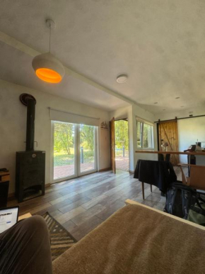 Casita Container al rio y a 30 min del Mar!